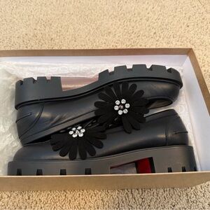 Christian Louboutin Black Loafers with Floral Embellishments